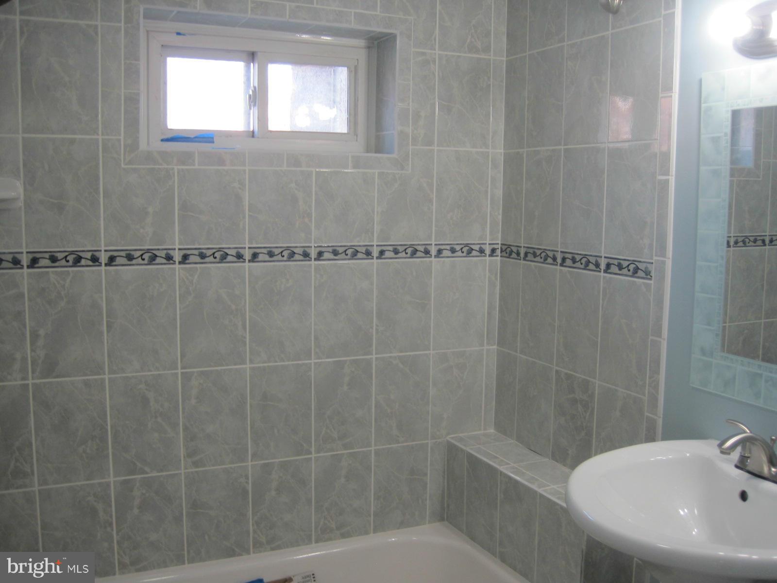 6517 Red Top Road Hyattsville, MD 20783 - Photo 21 of 23 a bathroom with a shower and a sink