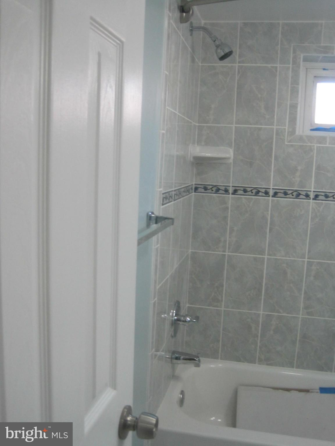 6517 Red Top Road Hyattsville, MD 20783 - Photo 22 of 23 a close view of a bathtub in a bathroom