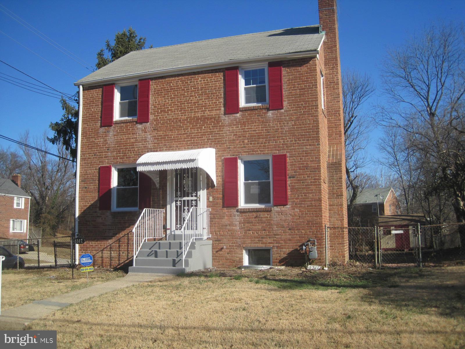 6517 Red Top Road Hyattsville, MD 20783 - Photo 5 of 23 a front view of a house with a yard
