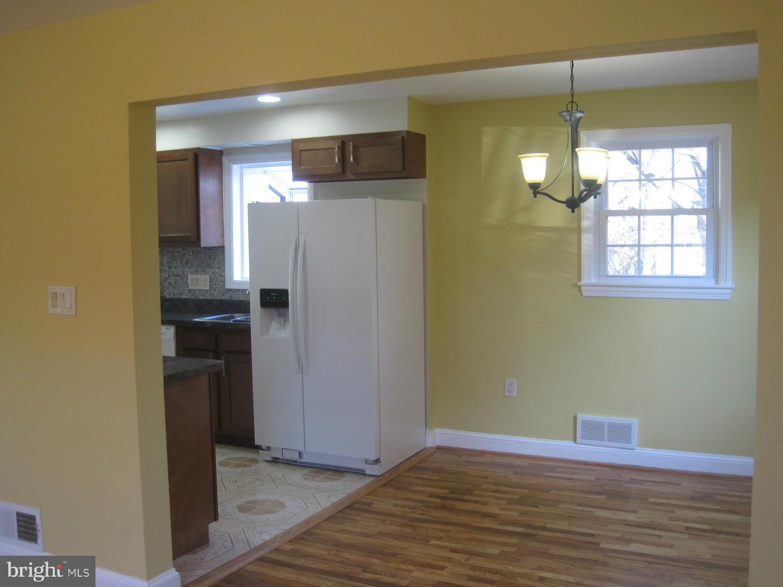 6517 Red Top Road Hyattsville, MD 20783 - Photo 9 of 23 a view of a kitchen from the hallway