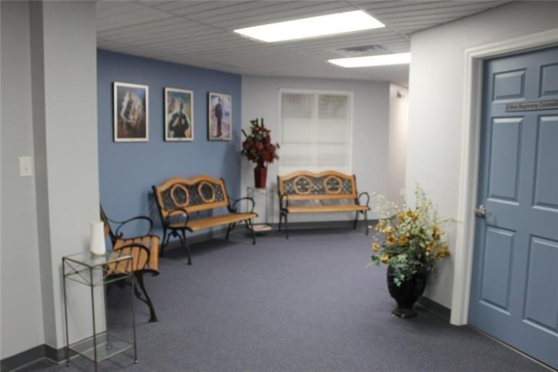220 South Main Street Butler, PA 16001 - Photo 10 of 15 a bedroom with furniture and a window