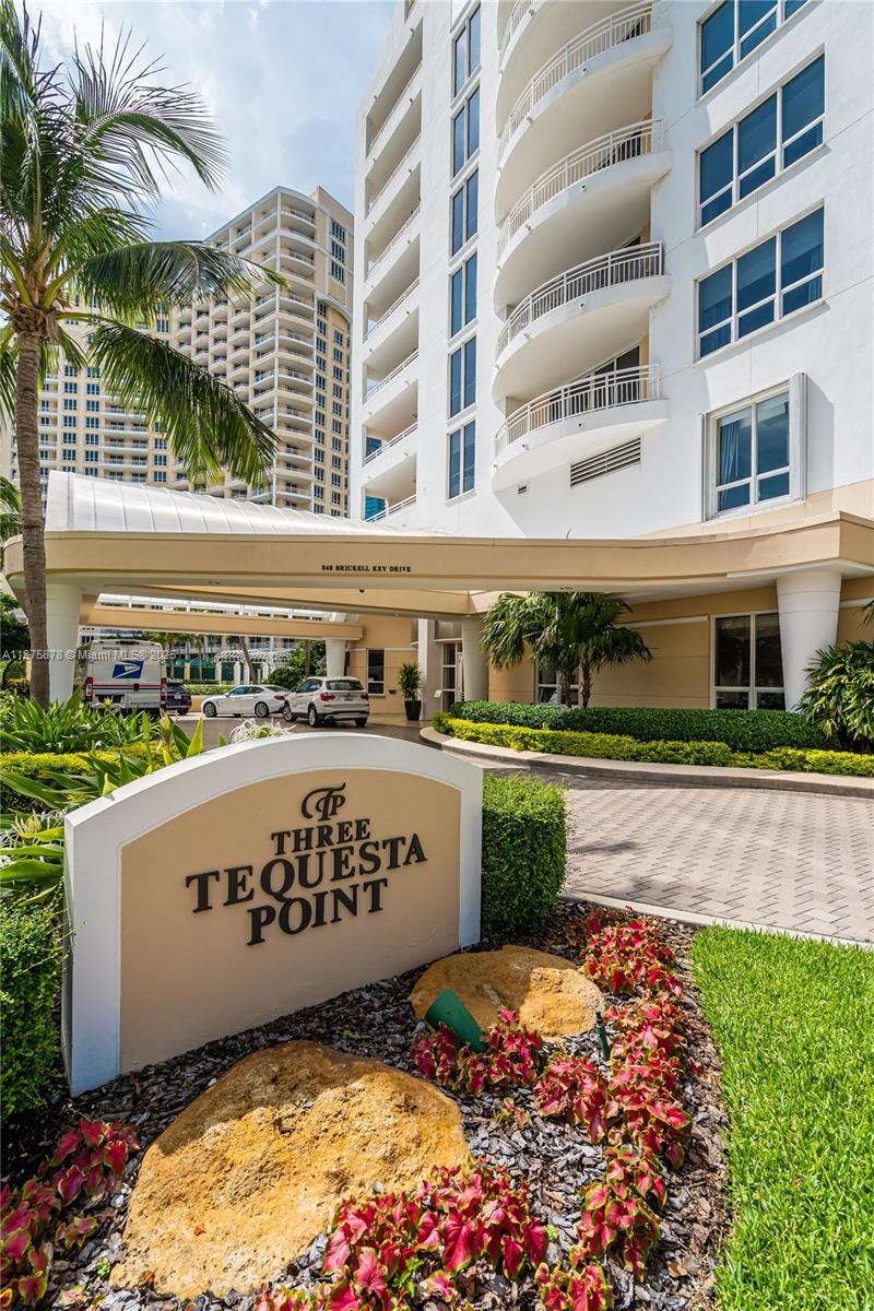 848 Brickell Key Drive, Unit 3803 Miami, FL 33131 - Photo 12 of 42 a front view of building with yard