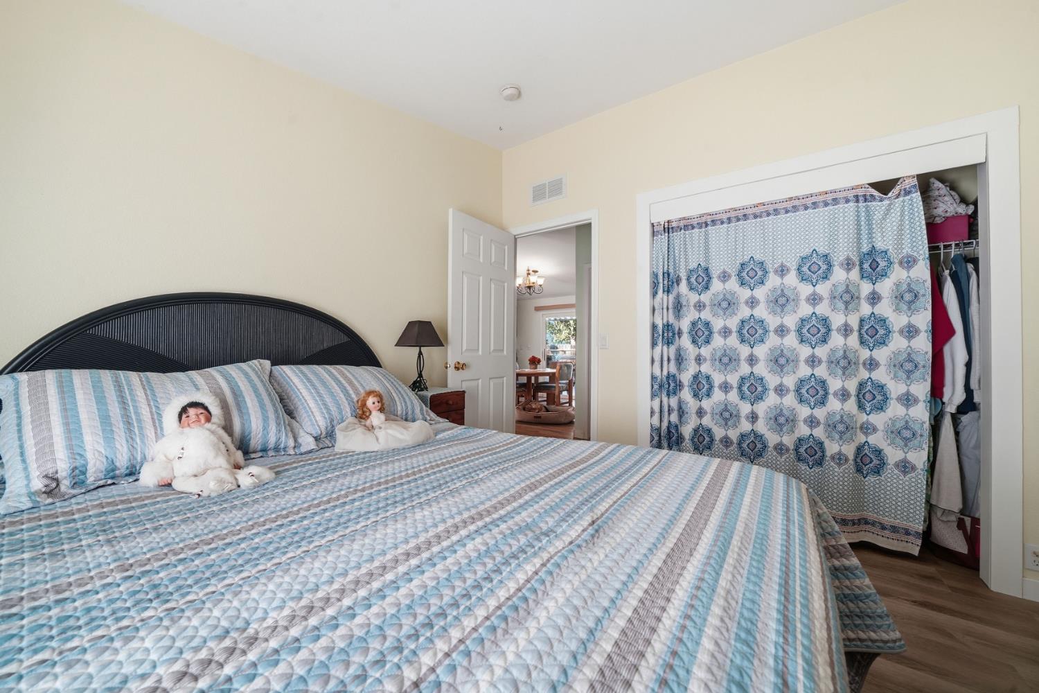1400 West Marlette Street, Unit 33 Ione, CA 95640 - Photo 25 of 33 a bedroom with a bed and a chair