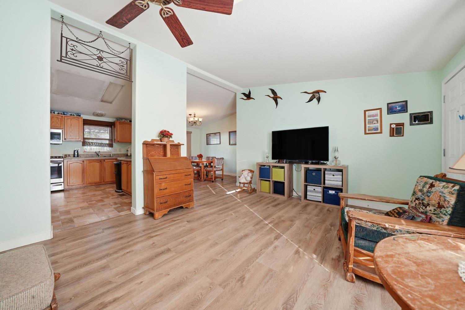 1400 West Marlette Street, Unit 33 Ione, CA 95640 - Photo 7 of 33 a living room with furniture and a flat screen tv