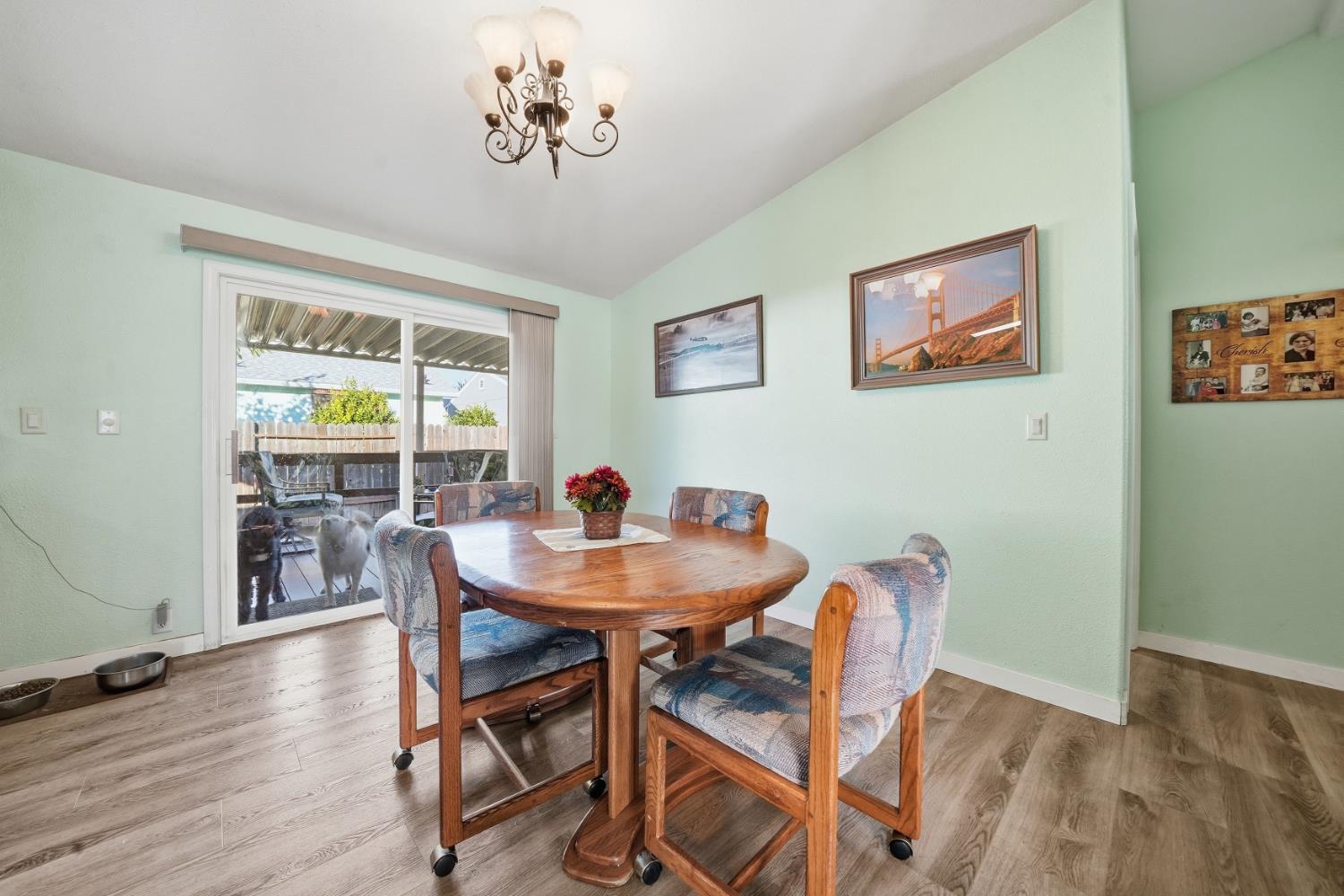 1400 West Marlette Street, Unit 33 Ione, CA 95640 - Photo 10 of 33 a view of a dining room with furniture window and wooden floor
