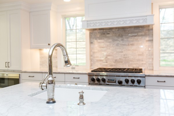 15 Priscilla Road Wellesley, MA 02481 - Photo 4 of 18 a kitchen with a stove a sink and a window