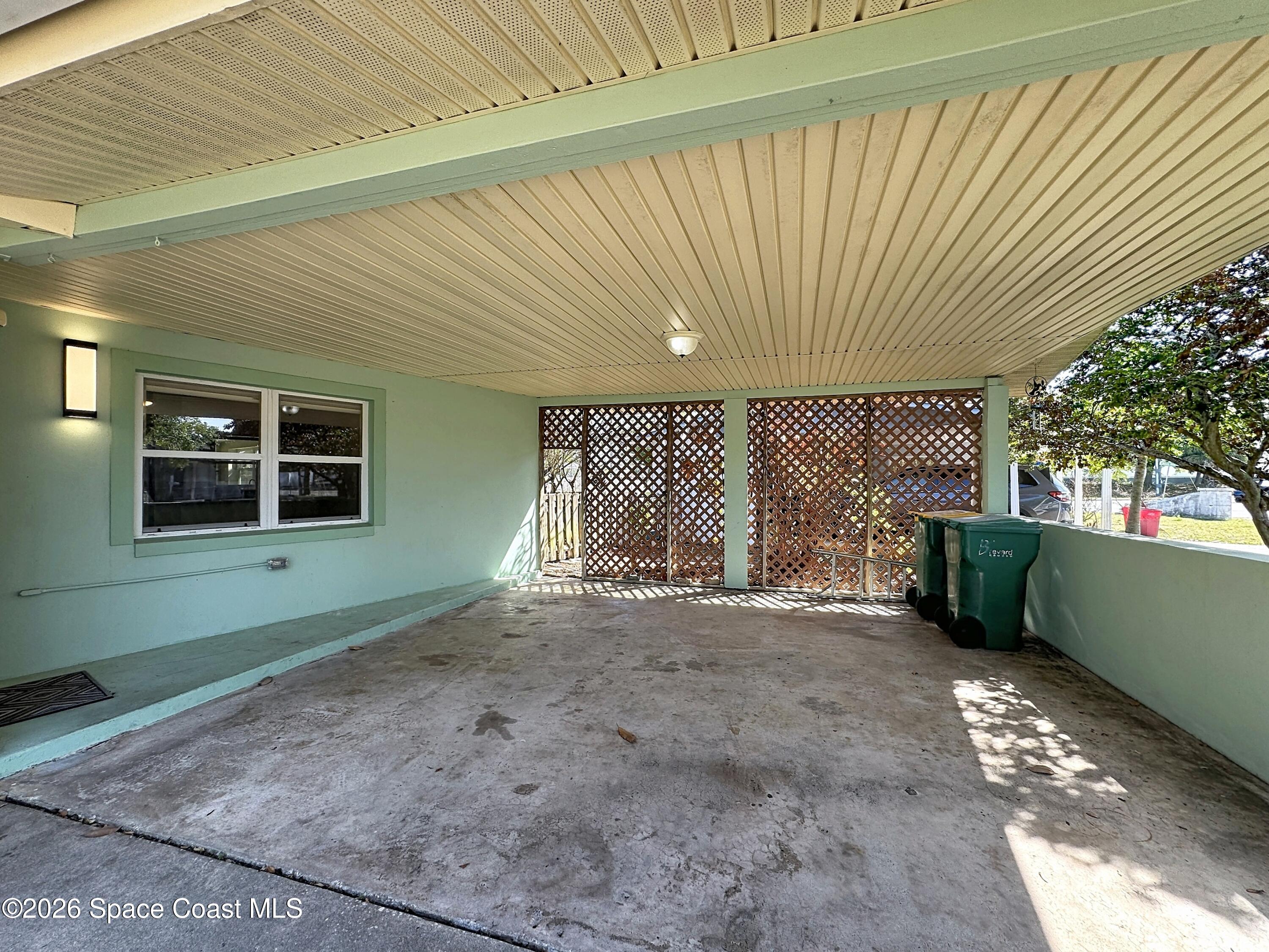 1315 Lester Court Merritt Island, FL 32952 - Photo 37 of 40 a view of an empty room with a window