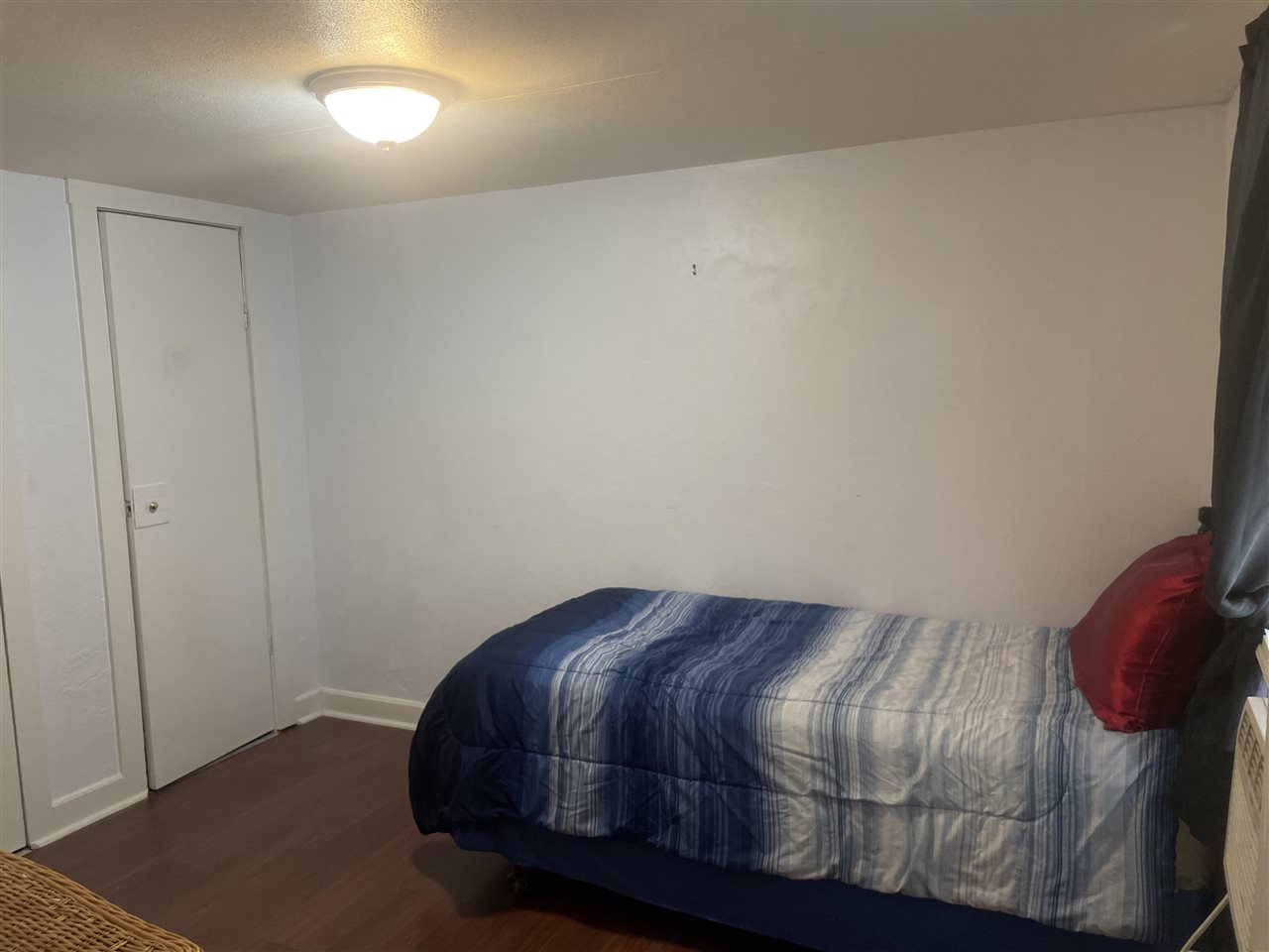 3268 E Road, Unit 43 Clifton, CO 81520 - Photo 11 of 15 a bedroom with a bed and a window