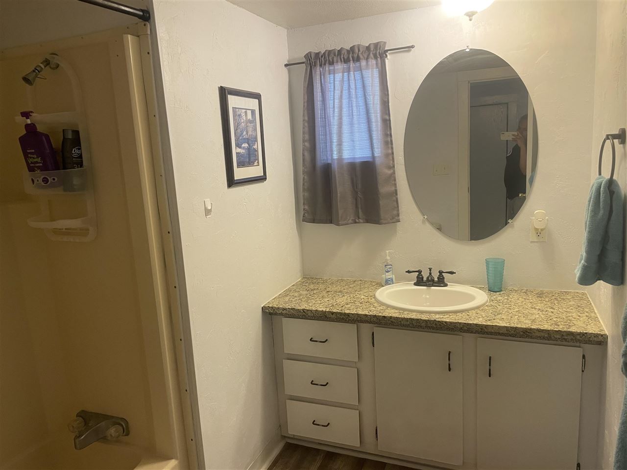 3268 E Road, Unit 43 Clifton, CO 81520 - Photo 15 of 15 a en suite bathroom with a double vanity sink and a mirror