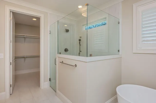 a bathroom with a granite countertop sink a toilet and a mirror