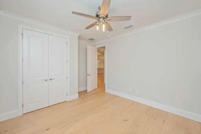 a view of an empty room with a large window