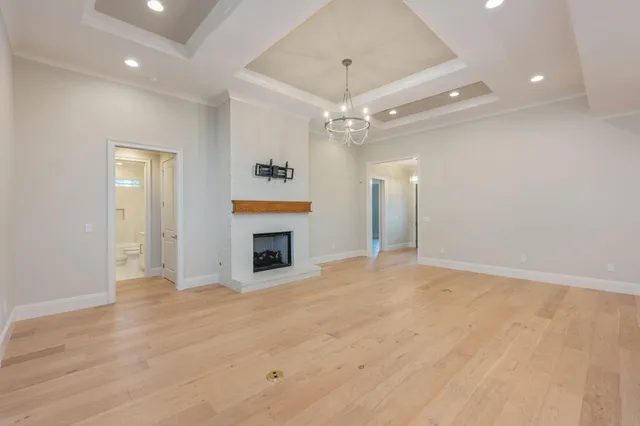 a kitchen with a sink cabinets and appliances