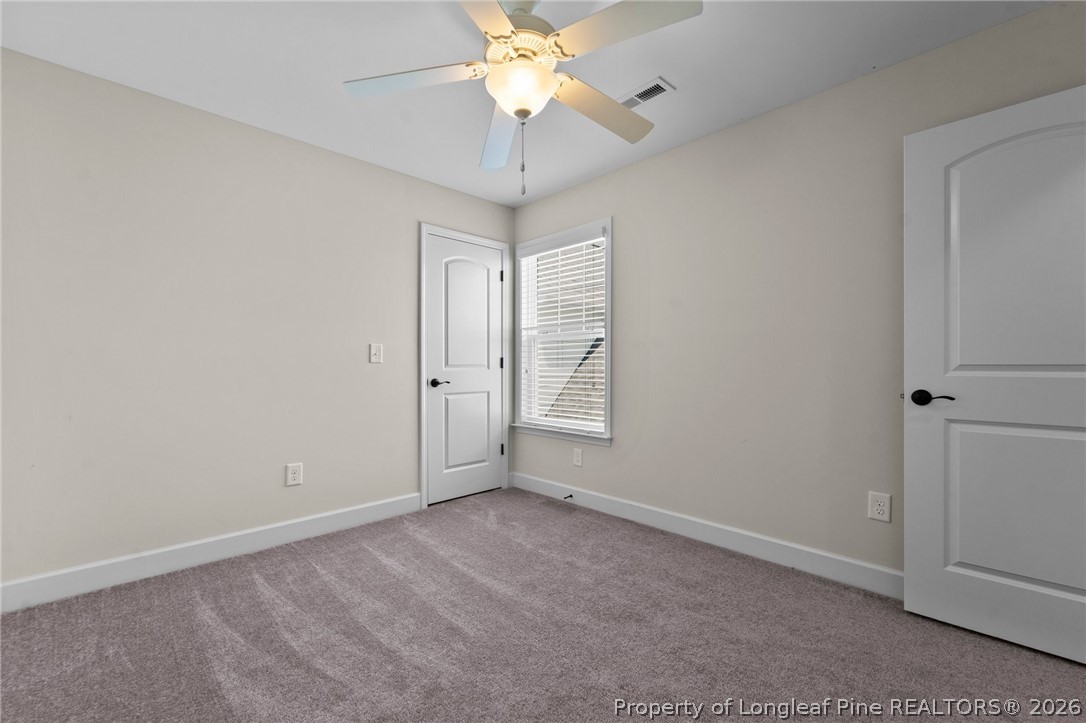 141 Pine Hawk Drive Spring Lake, NC 28390 - Photo 19 of 21 a view of an empty room with a window