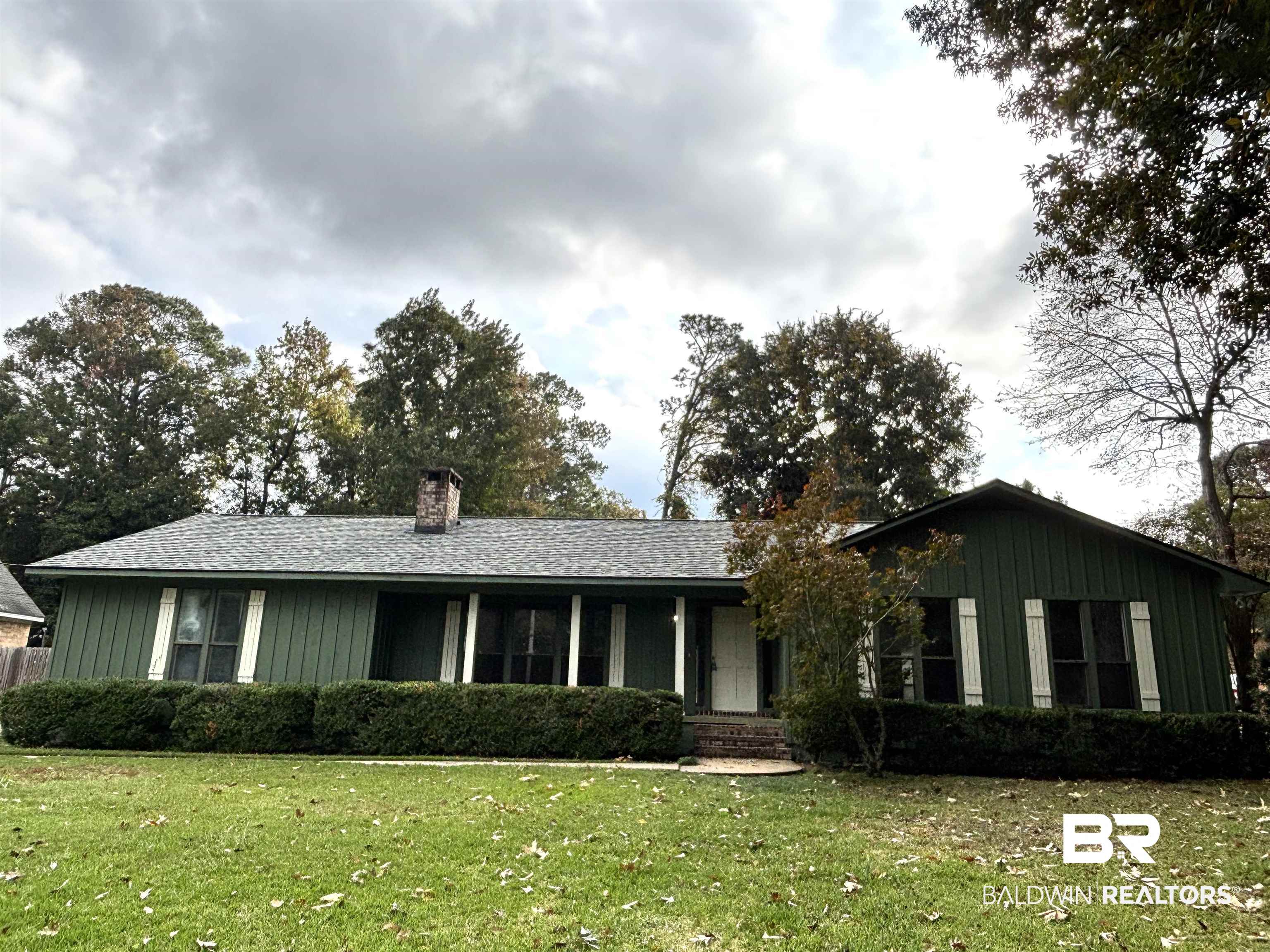 10 Soldiers Route Daphne, AL 36527 - Photo 1 of 26 Single story home featuring a porch, a front lawn, board and batten siding, and a chimney