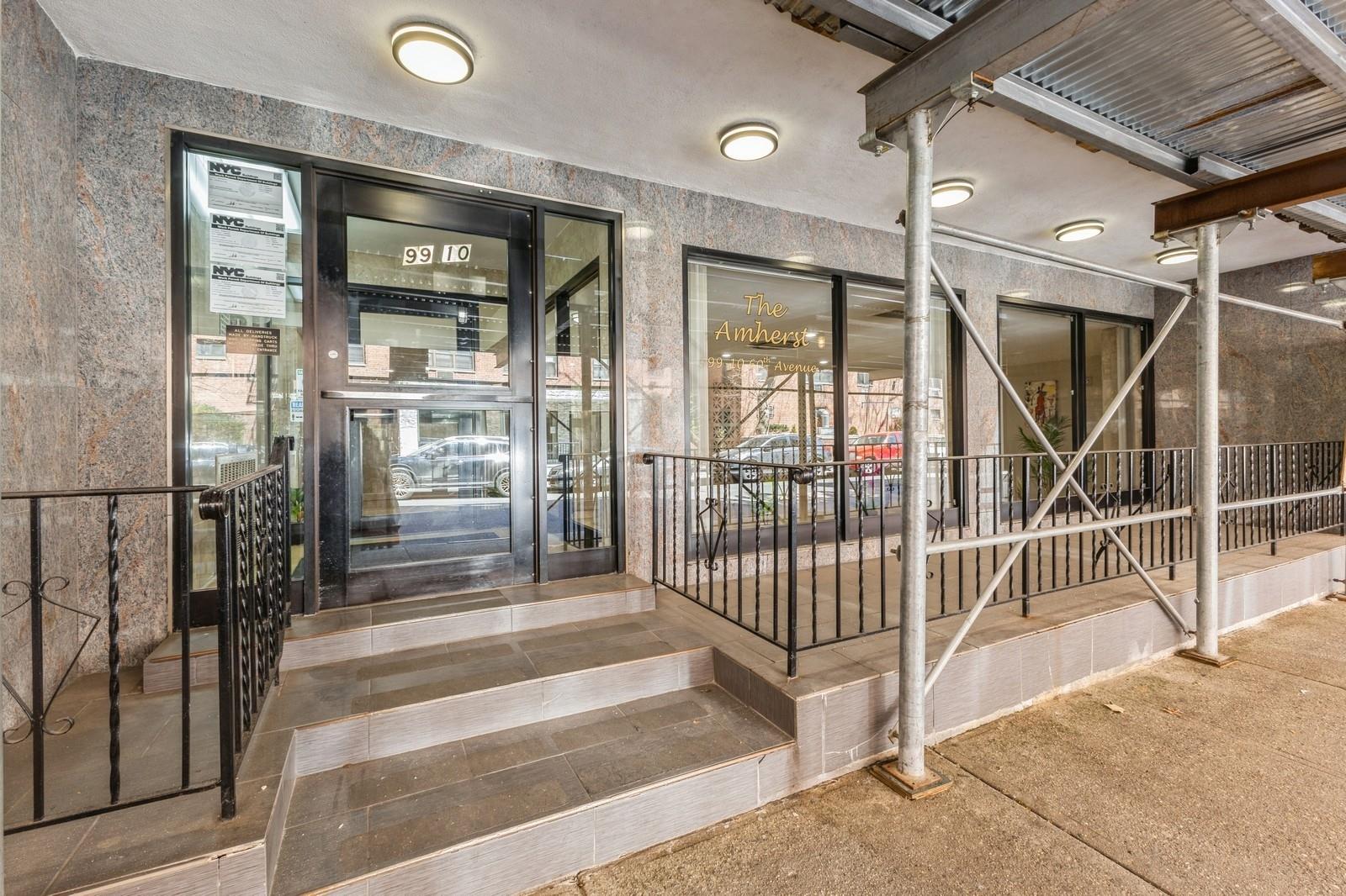 99-10 60th Avenue, Unit 1C1 Queens, NY 11368 - Photo 7 of 8 View of exterior entry