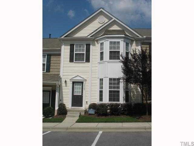 8309 Clasara Circle Raleigh, NC 27613 - Photo 1 of 9 a front view of a house with garden