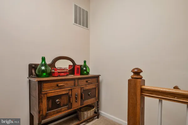 a view of storage and utility room with washer and dryer