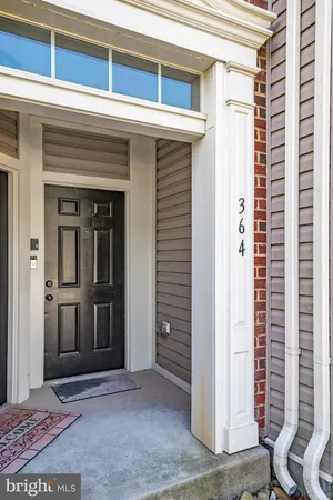 a view of entryway with a white door