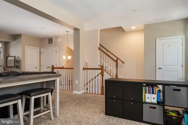 a view of kitchen with cabinets and wooden floor