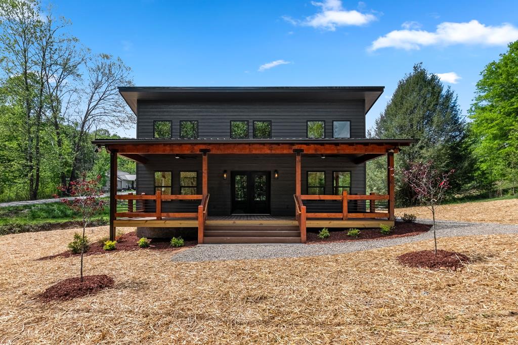168 Ewing Street Blue Ridge, GA 30513 - Photo 1 of 46 an outdoor view of house with a backyard