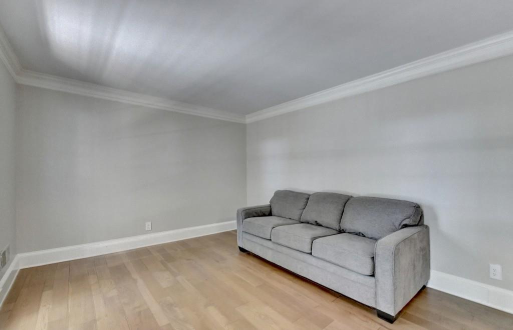 3791 Old Bridge Way Duluth, GA 30096 - Photo 14 of 58 a living room with furniture and a wooden floor