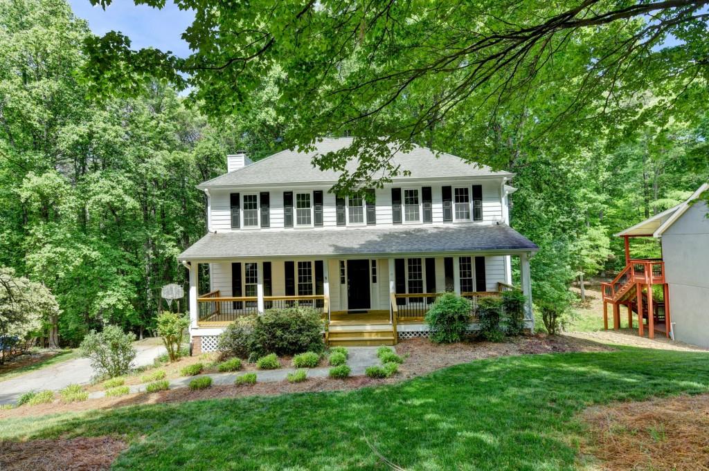 3791 Old Bridge Way Duluth, GA 30096 - Photo 2 of 58 a front view of a house with a yard