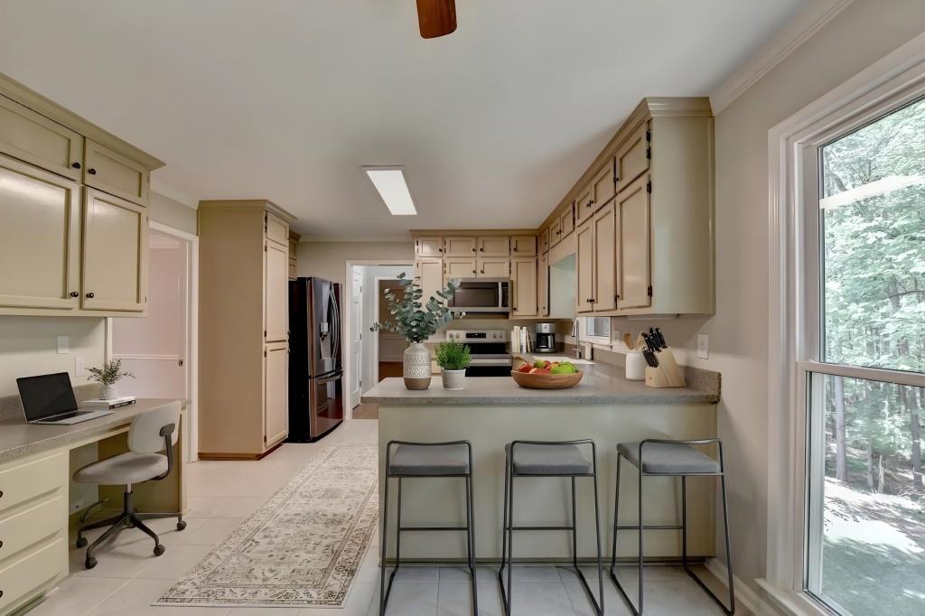 3791 Old Bridge Way Duluth, GA 30096 - Photo 27 of 58 a kitchen with stainless steel appliances granite countertop a sink and cabinets