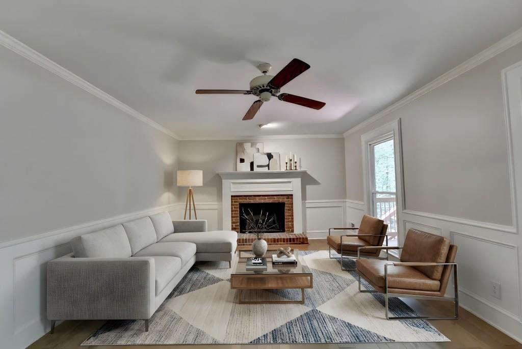 3791 Old Bridge Way Duluth, GA 30096 - Photo 30 of 58 a living room with furniture and a fireplace