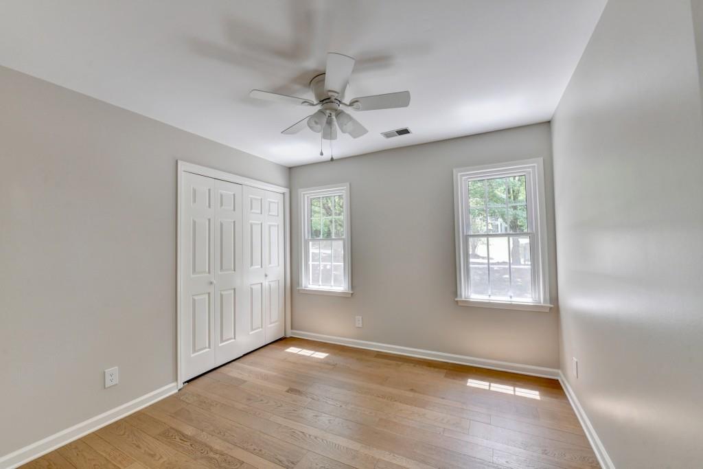 3791 Old Bridge Way Duluth, GA 30096 - Photo 38 of 58 wooden floor in an empty room with a window