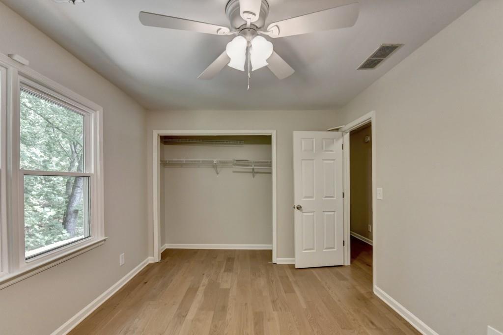 3791 Old Bridge Way Duluth, GA 30096 - Photo 43 of 58 wooden floor in an empty room with a window