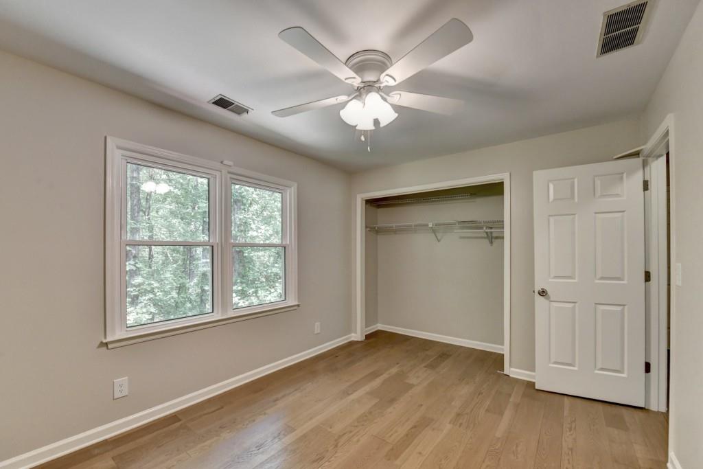 3791 Old Bridge Way Duluth, GA 30096 - Photo 44 of 58 a view of an empty room with wooden floor and a window