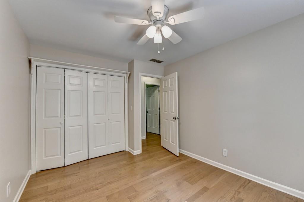 3791 Old Bridge Way Duluth, GA 30096 - Photo 48 of 58 a view of an empty room with a chandelier fan