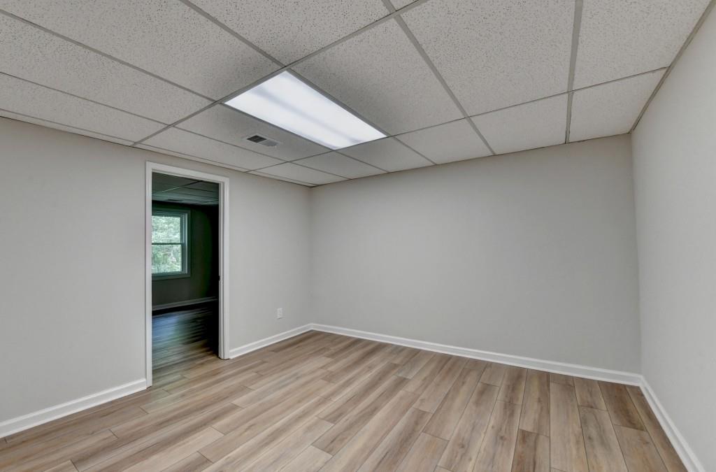 3791 Old Bridge Way Duluth, GA 30096 - Photo 49 of 58 a view of an empty room with wooden floor