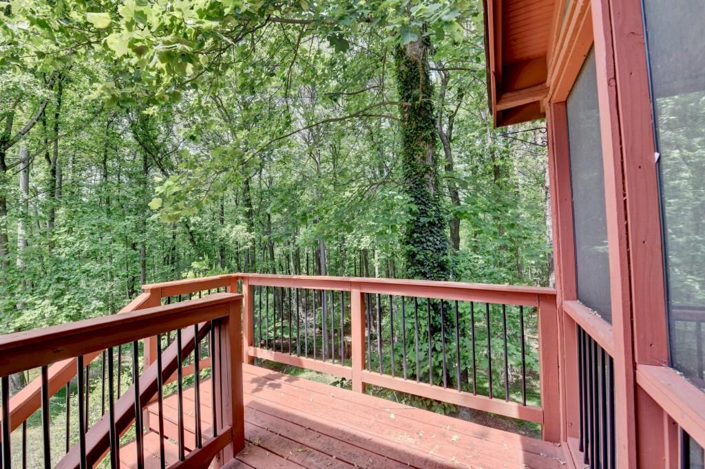3791 Old Bridge Way Duluth, GA 30096 - Photo 57 of 58 a view of a wooden deck next to a yard