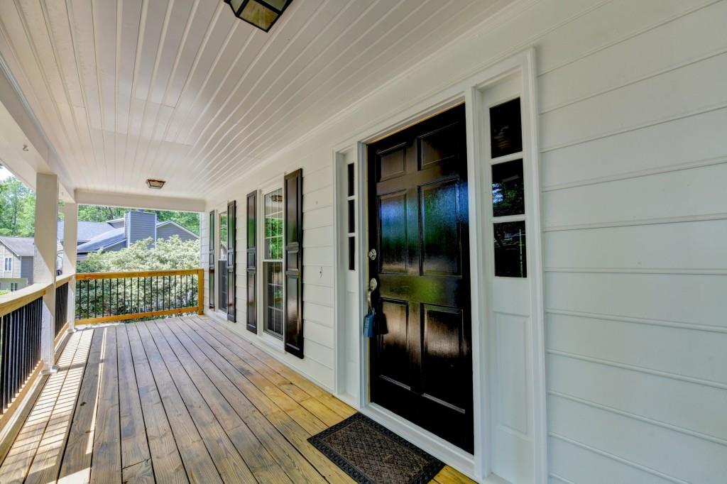 3791 Old Bridge Way Duluth, GA 30096 - Photo 6 of 58 a view of front door deck and living room