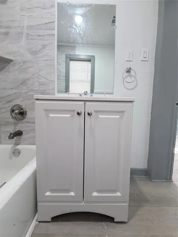 a bathroom with a bathtub