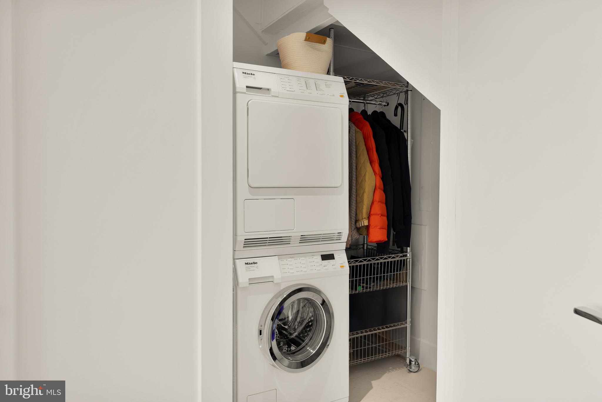 2501 M Street Northwest, Unit 704 Washington, DC 20037 - Photo 30 of 31 In-Residence Laundry with Storage