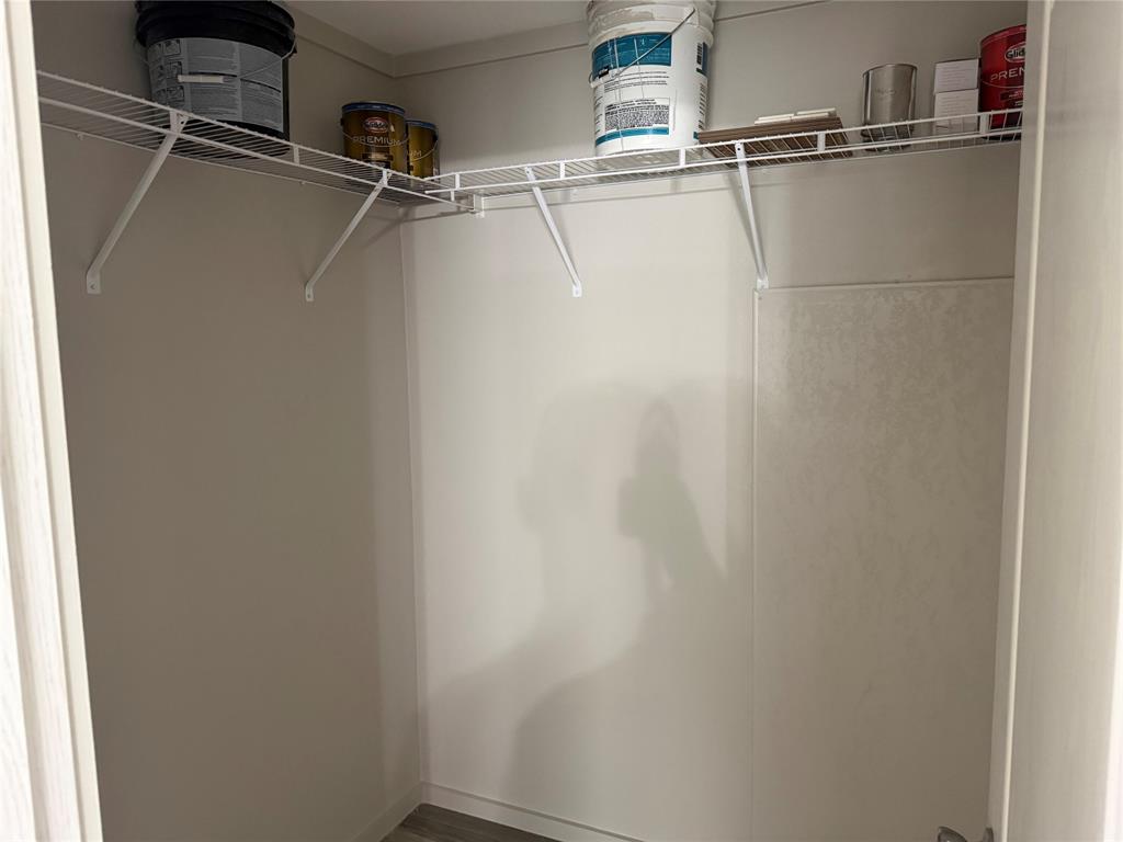 358 Reast Road Whitesboro, TX 76273 - Photo 11 of 21 a view of a room with racks on the wall