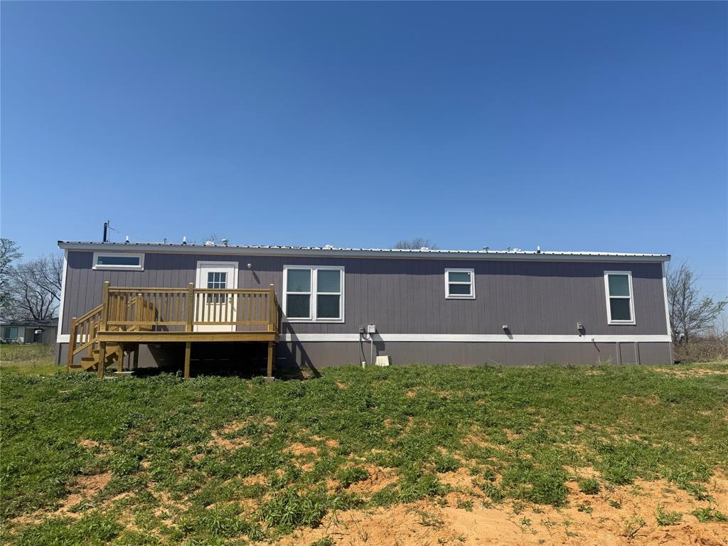 358 Reast Road Whitesboro, TX 76273 - Photo 19 of 21 a front view of a house with a yard
