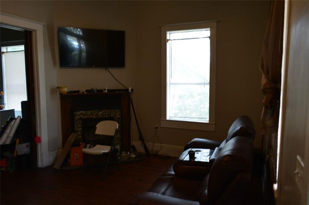 251 Ward Street Macon, GA 31201 - Photo 4 of 14 a living room with furniture and a flat screen tv