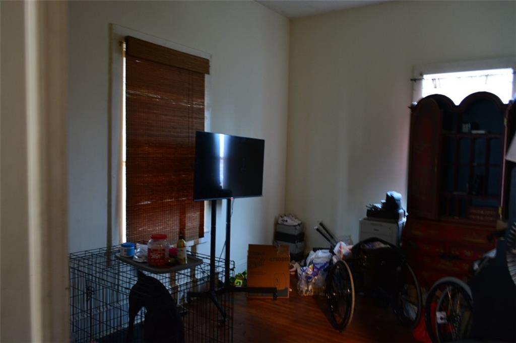 251 Ward Street Macon, GA 31201 - Photo 5 of 14 a living room with furniture and a flat screen tv
