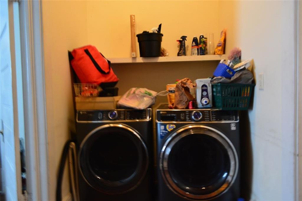 251 Ward Street Macon, GA 31201 - Photo 7 of 14 a utility room with dryer and washer