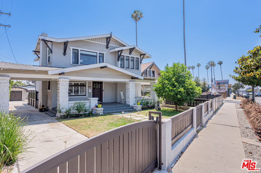 4530 West Washington Boulevard Los Angeles, CA 90016 - Photo 4 of 46 a view of a house with wooden deck and furniture