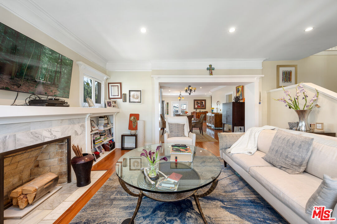 4530 West Washington Boulevard Los Angeles, CA 90016 - Photo 8 of 46 a living room with furniture and a fireplace