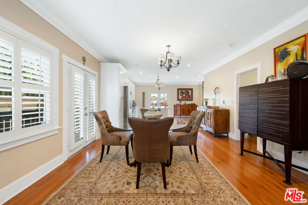 4530 West Washington Boulevard Los Angeles, CA 90016 - Photo 10 of 46 a view of a dining room with furniture window and wooden floor