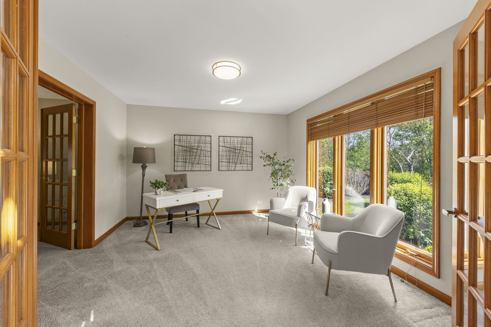 6621 Greene Road Woodridge, IL 60517 - Photo 12 of 42 a living room with furniture and a large window