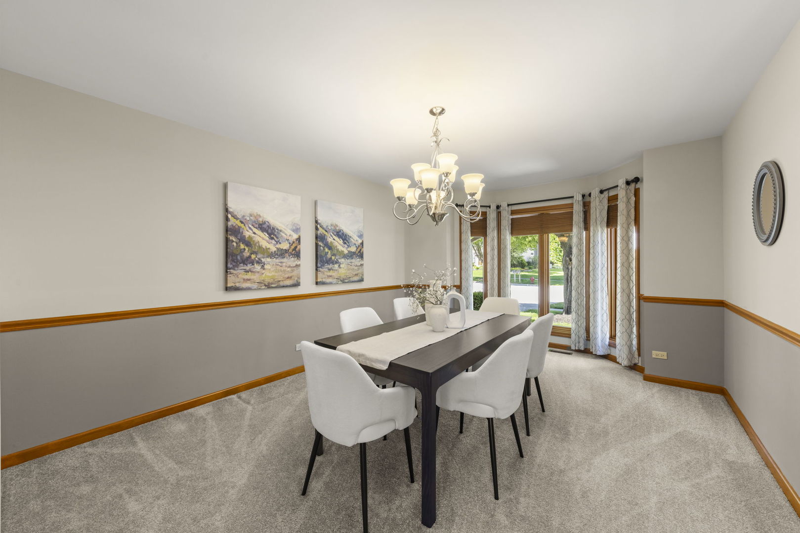 6621 Greene Road Woodridge, IL 60517 - Photo 9 of 42 a view of a dining room with furniture and a chandelier