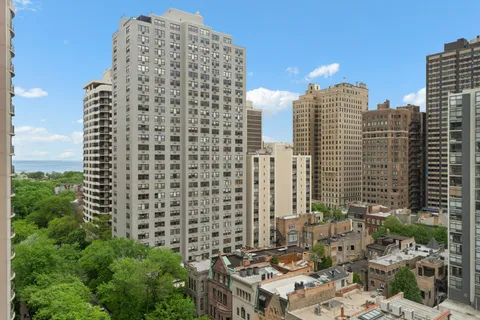 a view of a city with tall buildings