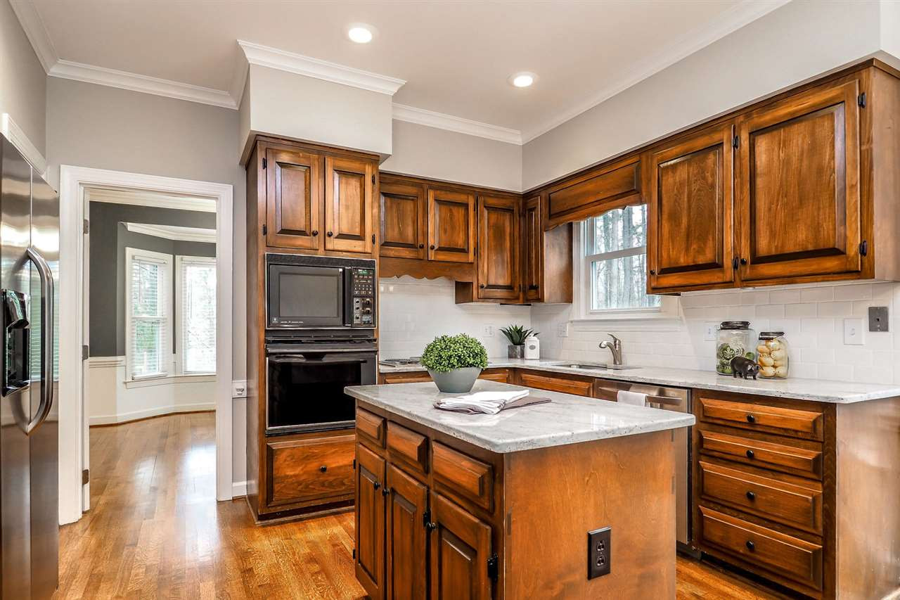 10709 Old Brook Court Raleigh, NC 27614 - Photo 3 of 11 Kitchen also has fresh paint and light granite Kitchen