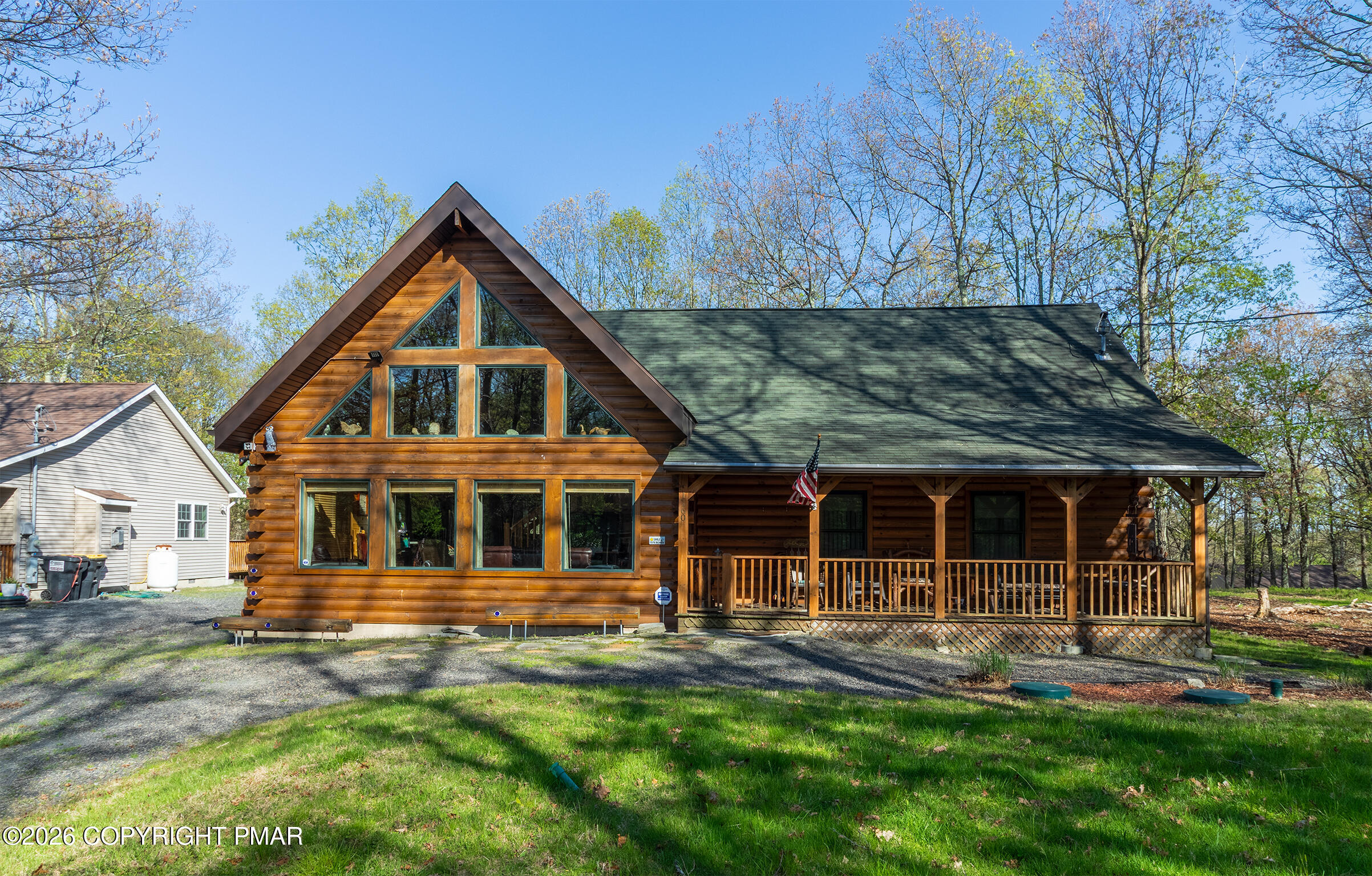 1160 Bluebird Lane Bushkill, PA 18324 - Photo 38 of 44 a front view of a house with a yard